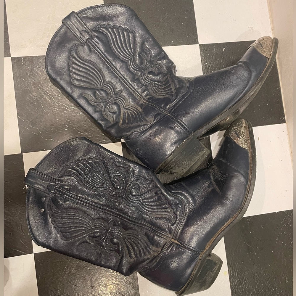 Blue cowboy boots with silver tip detail